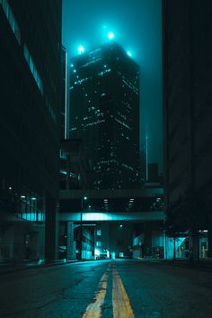 A low to the ground shot in the middle of a street in downtown Dallas. City At Night Background, Dark City Night Aesthetic, Dark City Photography, Night City Background For Editing, City At Night Art, Midnight Aesthetic City, City Photography Ideas