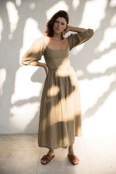 Our most popular style, the Bellflower Dress blooms just in time for the warmer months. Now in our ne khaki shade. the Bellflower celebrates simplicity and timeless style, tailored in 100% washed linen with tiny dot details, that falls effortlessly. she boast an elegant scooping neckline and romantic puffed sleeves tha Kara Thoms, Living Simply, Magnolia Pearl, Dreamy Dress, Puffed Sleeves, Yohji Yamamoto, Just In Time, Linen Dress, Popular Style