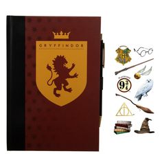 a harry potter notebook with hogwart's crest, wands and other items