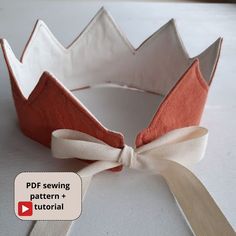 a paper crown with a ribbon tied around it