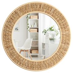 a mirror that is on the wall in front of a chair and shelves with plants