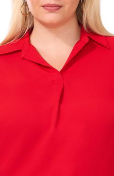 Feel the polish of this fluid collared top that's perfect from desk to dinner. 27" front length; 29 1/2" back length (size 2X) Johnny collar Long sleeves with button cuffs 100% polyester Machine wash, tumble dry Imported Formal Solid Blouse With Placket, Formal Blouse With Placket, Formal Solid Tops With Placket, Red Collar Blouse For Work, Red Collared Top For Formal Occasions, Red Collared Blouse For Formal Occasions, Formal Tops With Collared Neckline And Placket, Red Spread Collar Top For Formal Occasions, Red Formal Top With Spread Collar