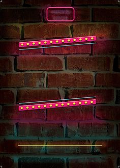 a brick wall with neon lights on it