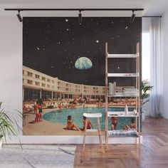 an indoor swimming pool with people in it and the moon shining over the water wall mural print