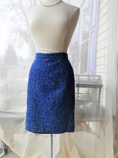 "Vtg 1970's  Ladies Blue Wool Skirt|Vtg French Boucle Blue Pencil Skirt|Vtg Terry Retro Ladies Skirt sz S I love this skirt!  It is a vintage 1970's wool boucle piece by Terry.  Made in France, this skirt is great quality with a mix of colours in the fabric.  I call boucle \"nubby wool\".  I don't see any of this fabric being made anymore unfortunately.  The blues here are so bright and vibrant!  The style is a pencil or broomstick, very popular in the 1970's. There is a kickpleat in back here a Retro Blue Mini Skirt, Vintage Blue Skirt For Work, Retro Blue Lined Skirt Bottoms, Retro Blue Lined Skirt, Blue Retro Mini Skirt For Spring, Retro Fitted Blue Mini Skirt, Vintage Blue Lined Skirt, Blue Lined Vintage Skirt, Vintage Blue Skirt