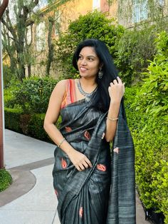 Elevate your wardrobe with our exquisite Smoky Black Ghicha Silk saree, a fusion of tradition and modern elegance. Crafted with precision, this luxurious saree boasts the finest Ghicha Silk, renowned for its lustrous texture and superior quality. Its smoky black hue adds allure, making it perfect for any occasion, from daytime events to evening soirees. What sets this saree apart are its meticulously embroidered motifs, each telling a story of craftsmanship and artistry. Skillfully stitched by a Designer Black Tussar Silk Saree, Embroidered Pre-draped Tussar Silk Saree, Elegant Black Slub Silk Traditional Wear, Transitional Season Black Semi-stitched Pre-draped Saree, Designer Black Raw Silk Saree, Black Slub Silk Saree, Black Chanderi Pre-draped Saree With Self Design, Black Silk Pre-draped Saree With Self Design, Black Raw Silk Saree With Self Design