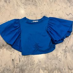 Great Condition. Never Worn. Trendy Blue Zara Tops, Zara Light Blue Party Top, Chic Blue Tops For Day Out, Zara Blue Stretch Tops, Blue Stretch Tops By Zara, Chic Blue Top For Brunch, Chic Blue Tops For Brunch, Blue Crop Top, Blue Crop Tops