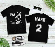 "Celebrate their birthday milestone with this unique t-shirt. Please note that by default, the black color t-shirts will have white vinyl and the other color t-shirts will have black vinyl. Raglan are 3/4 sleeves. We use cotton t-shirts that are comfortable to touch and wear. We use kid safe ink. Our t-shirts are designed and pressed at our shop and usually ship in 1-2 business days. WASHING & CARE: Take care to wash inside out and on cold or warm cycle with little detergent. Hang or lay fla Black T-shirt With Name Print For Birthday, Black T-shirt With Letter Print For Party, Black Number Print T-shirt For Birthday, Birthday Black T-shirt With Number Print, Black Summer T-shirt For Birthday, Black Graphic Tee For Party, Third Birthday Shirt, 2nd Birthday Shirt, T Shirt For Boys