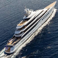 a large white boat in the middle of the ocean