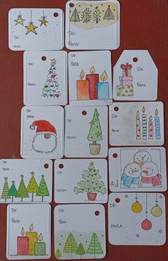 christmas tags with pictures of different things on them, all decorated in watercolor and colored pencils