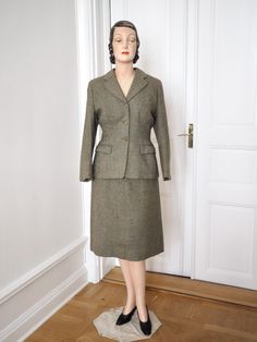 Luxurious and rare 1940s tweed suit!  Look at the close ups of the fabric - it's just so very beautiful with shades of brown,  blue, green and beige...  The jacket has padded shoulders and figure flattering princess seams.  Breast pocket and pockets at sides.  Skirt closes with metal zipper and dressed button at side. Adorable label from Swedish "Stadion" at neck of jacket.  Measurements: JACKET  Shoulder 38 cm/ 14.9"  Bust 96 cm/ 37.7"  Waist 76 cm/ 29.9"  Length 61 cm/ 24"  Inner length of arm 38 cm/ 14.9"   SKIRT Waist 66 cm/ 25.9" + about 5 cm/ 1.96" to take out at side seam and a lot to take out at back seam.  Hip 104 cm/ 40.9  Length 70 cm/ 27.5  Excellent condition. Just marvelous! Looks hardly worn. A little shift in color the the lining (last picture). Such a gem to treasure for g Tweed Suits, Princess Seam, Blazer Suit, Suits For Women, Pencil Skirt, Favorite Outfit, Art Collection, Blazer, Bathing Beauties