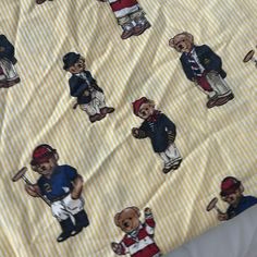 a teddy bear print fabric with baseball players on it