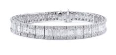 This 18K White Gold Diamond Bracelet features both beautiful baguette cut Diamonds alongside round brilliant cut Diamonds and precious 18K white gold to keep your style stunning and exquisite. Baguette Bracelet, White Gold Diamond Bracelet, Gold Diamond Bracelet, Diamond Baguette, Baguette Cut Diamond, Baguette Cut, Baguette Diamond, Round Brilliant Cut Diamond, Round Brilliant Cut