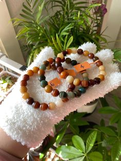 📿 印尼料天然混干预 📿 卡10.3mm小蜜罐 You will get the bracelet in the pictures. The bead size is 0.4 inches and the wrist size is 6.9 inches.  This Bodhi root bracelet has a distinctive, aged appearance due to an accelerated weathering process induced by humans. No dyes were used on the beads! But, If you prefer a natural look, this bracelet may not be the right fit for you. You could look at the naturally weathered Bodhi root bracelet in my shop. Please feel free to contact us with any questions. Many people say Bodhi Root Bracelets bring a sense of peace and relaxation. These bracelets are often used for mantra counting, prayer, and meditation. Bodhi seeds can help level up your awareness and concentration. The longevity of this bracelet can be improved by avoiding water and prolonged exposure to d Mala Beads Bracelet, Mala Beads, Beads Bracelet, Bracelet Gift, Level Up, Relaxation, Sense, Beaded Bracelets, Bring It On