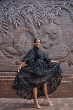 This gorgeous dress features lace detail a puff sleeve and a high low detail for an extra touch of glam! Belt not included. Model is wearing a small. Black Women Dress, Hobble Skirt, Traditional African Clothing, Twin Beds, Queen Size Bed, Fancy Dress Design, Long Sleeve Floral Dress, Formal Style, Romper Dress