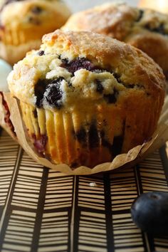 blueberry muffins sitting on top of a table