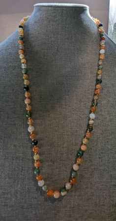 Vintage Multi Gemstoone Beaded Necklace 30" Fine beaded gemstone necklace featuring Carnelian, Agate, Lapis, Jade and Bloodstone beads with small textured Gold Filled spacer beads. Necklace will arrive gift boxed. * HALLMARKS Unmarked. * MEASUREMENTS  30" long with 7mm beads. * CONDITION In very good to excellent condition. Please use pictures as part of item's description. * MATERIALS Multi gemstones, gold filled spacer beads. Long Agate Beaded Necklace With Faceted Beads, Agate Beaded Necklace With Faceted Beads As Gift, Gift Multicolor Jade Beaded Necklaces, Gift Multicolor Jade Beaded Necklace, Multicolor Aventurine Gemstone Bead Jewelry, Aventurine Beaded Necklace With Faceted Beads As Gift, Multicolor Aventurine Gemstone Beaded Jewelry, Gift Aventurine Beaded Necklace With Faceted Beads, Healing Agate Faceted Beads