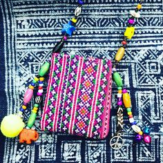 If you love bohemian style , you must have these exotic amulet purse! They are made from vintage Hmong skirt and accented with beads , bells , pompom or tassel.Please acceptance that the bag may not be exactly the same pattern because I cut from the vintage embroidery blouse. Yellow peace with Ohm  Size around 6.5 cm. X 7.5 Elephant  Size 7.5 cm.x 7.5 cm. Bohemian Handmade Pink Shoulder Bag, Bohemian Shoulder Bag With Tassels As Gift, Bohemian Shoulder Bag With Tassels For Gift, Bohemian Beaded Shoulder Bag For Gift, Bohemian Fair Trade Bags For Festivals, Bohemian Beaded Bags With Multicolor Embroidery, Beaded Bohemian Shoulder Bag For Festival, Bohemian Handwoven Shoulder Bag For Festivals, Bohemian Multicolor Fair Trade Shoulder Bag