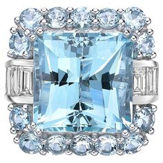 This collection features an array of aquamarines with an icy blue hue that is as cool as it gets! Accented with diamonds these rings are made in white gold and present a classic yet elegant look. 11.8 Carat Aquamarine, Rhodolite and Diamond Ring in 18 Karat White Gold. Aquamarine: 11.86 carat, 13.20X13.20X9.70mm size, Square Shape. Aquamarine: 1.625 carat, 3.20mm size, Round Shape. Rhodolite: 0.83 carat, 4.00mm size, Cabochons cut, Round Shape. White Diamond: 0.118 carat, 2.50mm size, round shap Formal Light Blue Diamond Ring, Formal Light Blue Aquamarine Diamond Ring, Luxury Blue Topaz Halo Ring, Luxury Aquamarine Diamond Ring With Prong Setting, Light Blue Aquamarine Diamond Ring With Center Stone, Luxury Light Blue Ring With Brilliant Cut, Luxury Light Blue Aquamarine Rings, Luxury Light Blue Brilliant Cut Ring, Luxury Blue Topaz Ring In Platinum