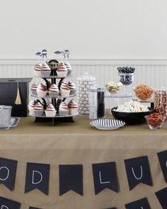 a table with desserts and snacks on it