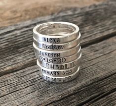 Beautiful .925 Sterling Silver Hand-Stamped Metal Stacking Rings, or Mother's Rings! Can be personalized with names, numbers, and hearts or even short phrases! Rings come in whole sizes only, and are about 3mm in width. Perfect for stacking 2 or 3 together! Available symbols- Heart, Paw print, &, + (I do not have other symbols small enough to fit on the rings) Please note that the more characters (letters/numbers) that I hammer into a ring, the more the band will stretch size, usually no more th Silver Hand Stamped Rings For Mother's Day, Silver Stamped Stackable Promise Rings, Adjustable Stamped Engraved Ring For Anniversary, Hand Stamped Stackable Rings For Anniversary, Silver Hand Stamped Rings For Anniversary, Adjustable Stamped Rings For Anniversary, Hand Stamped Silver Rings For Anniversary, Anniversary Engraved Sterling Silver Ring, Silver Hand Stamped Stackable Rings For Wedding