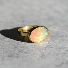 18K + 22K GOLD OPAL RING SIZE 6.5 – Corkie Bolton Jewelry Luxury Yellow Gold Opal Ring With Bezel Setting, Yellow Gold Ethiopian Opal Ring In Oval Cabochon Shape, Yellow Gold Opal Ring With Cabochon, Yellow Gold Ethiopian Opal Oval Cabochon Ring, Yellow Gold Ethiopian Opal Ring In Oval Shape, Ethiopian Opal Oval Cabochon Ring In Yellow Gold, Gold Ethiopian Opal Cabochon Ring, Gold Ethiopian Opal Ring With Oval Cabochon, Gold Opal Ring Oval Cabochon