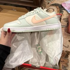 Nike Low Dunk In Pale Green And Crimson. Nike Round Toe Pastel Sneakers, Nike Pastel Sneakers With Round Toe, Pastel Sneakers With Branded Insole And Round Toe, Nike Low Dunk, Low Top Nikes, Nike Air Max Command, Dunk Lows, Nike Lunar Force, Nike Air Max 200