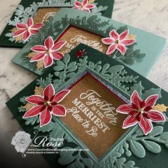 three handmade christmas cards with poinsettis on the front and back side