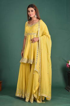 Beautiful yellow embroidered peplum sharara suit with dupatta. It is perfect for weddings and special occasions. Shop online from Pure Elegance. Sharara Suits, Sharara Suit, Fashion Journals, Anarkali Suits, Traditional Fabric, Designer Dresses Indian, Indian Design, Blouse Dress, Fashion Store