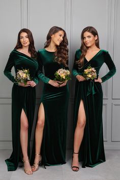 three women in green dresses standing next to each other with their legs split open and holding bouquets