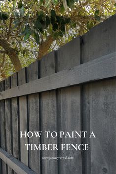 Image features a timber fence which has been painted black using a Wagner spray gun. The text overlay says ‘how to paint a timber fence like a pro’. Dark Painted Fence, Grey Wood Fence, Paint Old Fence, Gray Fence Backyard, Charcoal Grey Fence Paint, Grey Wooden Fence, Painting Backyard Fence, Fence Paling Ideas