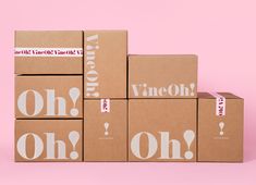 four cardboard boxes stacked on top of each other with the words wine - oh written on them