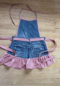 an apron made out of old jeans on the floor