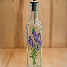 a bottle that has some flowers in it