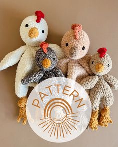 three crocheted chickens sitting next to each other