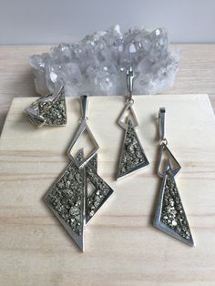 Druzy Pyrite silver jewelry set for woman Armenian jewelry Pyrite ring Pyrite earrings Golden stone triangle jewelry Unusual gifts for her 【FULL DETAILS】 ▶Gemstone: Natural pyrite ▶RING SIZE: Choose your US size ▶RING WEIGHT: 12 gr ▶EARRINGS WEIGHT: 18.6 gr ▶EARRINGS LENGTH: 68 mm ▶EARRINGS WIDTH: 16 mm ▶Pendant weight: 21.3 gr ▶Pendant size: 93 mm * 36 mm ◦* ◦* ◦* ◦* ◦* ◦* ◦* ◦* ◦* ◦* ◦* ◦* ◦* ◦* ◦* ◦* ◦* ◦* ◦* ◦* ◦* ✎ Please, view my store policies before buying this item here. https://www.ets Pyrite Ring, Pyrite Earrings, Armenian Jewelry, Pyrite Pendant, Triangle Jewelry, Mushroom Jewelry, Silver Jewelry Set, Red Stone Ring, Earrings Golden