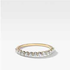 Tiny round cut diamonds in a shared prong setting lend their delicate sparkle to this petite and exquisite band. 2.0 mm band 0.50 carats total available in rose, yellow and white gold (select size and metal at checkout) Questions? Want to modify this ring? CONTACT US Nervous About Buying Jewelry Online? READ THIS Made in the USA. All sales are final. All Good Stone pieces are made to order – please allow 3-4 weeks for production, followed by 1-2 days for shipping! Trust us - we’re worth the wait Shared Prong Wedding Band, Pave Diamond Wedding Bands, Metal Wedding, Buy Jewellery Online, White Gold Wedding Bands, Cushion Cut Diamonds, Rose Yellow, Pear Diamond, Dream Ring