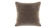 a brown pillow on a white background