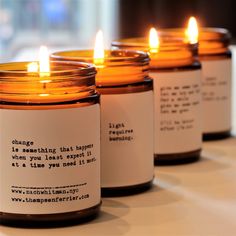 three candles that are sitting next to each other on a table with the words change written on them