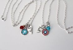 "Are you a fan of Steve Rogers and Tony Stark's relationship? This set of Marvel inspired friendship necklaces feature iconic silver charms for Captain America and Tony Stark. A perfect gift for your best friend or significant other who is your partner in crime! - You will receive a pair of necklaces (one Steve, one Tony). - Choose your charm options! - Choose your packaging: both in ONE box or separately in TWO boxes, for easy gifting! ----------☆---------- 24 inch shiny sterling silver plated Steve Tony, Marvel Jewelry, Bff Necklace, Steve And Tony, Bff Necklaces, Friendship Jewelry, Friendship Necklaces, Small Jewelry Box, Jewelry Fashion Trends