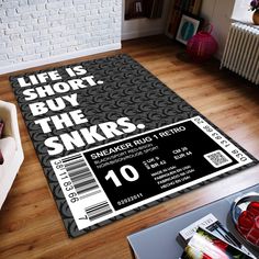 a living room area rug with an advertisement for snkrs