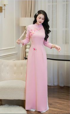 Vietnamese Ao Dai with sharp 3D printed motifs on silk fabric. Slim and lightweight design enhances the female figure. High quality silk material, slight stretch, very light and comfortable to wear. Pretty Ao Dai, Elegant Pink Ao Dai With Floral Embroidery, Pink Floral Embroidered Fitted Maxi Dress, Pink Fitted Floral Embroidered Maxi Dress, Fitted Pink Maxi Dress With Floral Embroidery, Traditional Ao Dai With Floral Print, Pink Full Length Maxi Dress For Spring, Full Length Floral Embroidered Dress, Elegant Ao Dai With Floral Embroidery For Spring