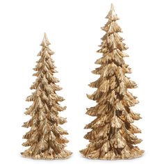 two gold christmas trees sitting next to each other