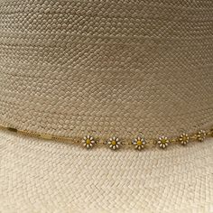 Elevate your look with our Rita straw Gambler Hat. Designed with the classic gambler hat silhouette as inspiration, this hat features a medium brim, a size adjustable sweatband, and a subtle daisy chain ornament for a hint of femininity. An ideal accessory for a day out in the sun, the Rita straw gambler hat adds a touch of elegance and sophistication to any outfit. **This item is a final sale, non-refundable and non-exchangeable. Tall crown: 11 cm | 4.33" Brim: 7.5 cm | 2.95" Color: natural bei Adjustable Gold Brimmed Boater Hat, Elegant Adjustable Boater Hat For Everyday, Gold Adjustable Flat Brim Sun Hat, Adjustable Everyday Boater Hat, Adjustable Gold Boater Hat For Summer, Adjustable Gold Hat Bands For Summer, Elegant Adjustable Sun Hat For Everyday, Gold Flat Brim Hat Bands For Spring, Adjustable Gold Hat Band For Kentucky Derby