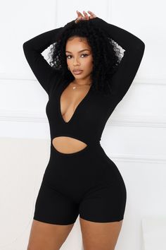 Thick ribbed sweater long sleeve romper featuring cutout detail Slip on closure Runs true to size Ribbed Long Sleeve Jumpsuits And Rompers For Spring, Ribbed Long Sleeve Jumpsuits For Spring, Spring Ribbed Jumpsuits And Rompers With Long Sleeves, Cutout Long Sleeve Stretch Bodysuit, Stretch Long Sleeve Cutout Bodysuit, Stretch Cutout Long Sleeve Bodysuit, Black Long Sleeve Ribbed Bodysuit, Long Sleeve Cutout Bodysuit For Night Out, Black Long Sleeve Bodysuit For Loungewear