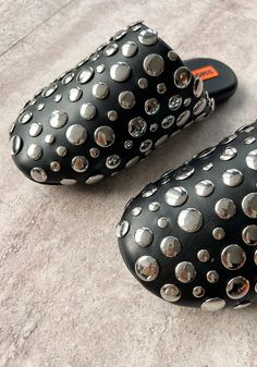 Vegan leather slippers with chrome studs.    50% polyester/50% polyurethane upper  rubber sole  made in china Parker Thatch, Simon Miller, Denim Hat, Leather Slippers, A Perfect Circle, Leather Shops, Engineered Garments, Sweater And Shorts, Made In China