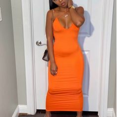 Low-V Midi Dress. Dress Is Cotton Material But Does Provide Stretch For Comfort. Orange V-neck Bodycon Dress For Summer, Orange V-neck Maxi Dress For Night Out, Casual Orange Maxi Dress For Night Out, Spring Orange Maxi Dress For Night Out, Orange V-neck Midi Dress For Night Out, Casual Orange Maxi Dress For Date Night, Black Tube Top Dress, Pink Wednesday, Wednesday Dress