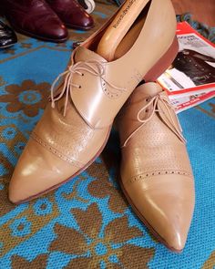 What a stunning pair of early 60s mod gems. Made by Super Modell circa 63. These are a Euro 42 which is a uk 7.5 to 8. Makers mark still visible on the inside,with light wear. A couple of light scuffs and creases to leather only which polish will just enrich.  The heel of right shoe shows a tiny split to leather,please see pics. These originals really don't pop up that often and they go for good money,I have 3 pairs listed which I acquired from the same 60s original Mod. For lovers of the origin Retro Brogue Detailing Closed Toe Oxfords, Retro Brogue Oxfords With Closed Toe, Retro Leather Oxfords With Pointed Toe, Retro Oxfords With Brogue Detailing, Retro Formal Oxfords With Leather Sole, Retro Oxfords With Brogue Detailing And Almond Toe, Retro Leather Sole Oxfords For Formal Wear, Retro Almond Toe Oxfords With Brogue Detailing, Retro Almond Toe Oxfords With Rubber Sole