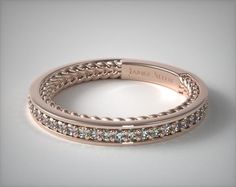 an 18k rose gold wedding band set with round brilliant cut diamonds and braided edges