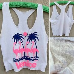 vintage Venice California cropped tank top half shirt flamingos palm trees S (?) | eBay Retro Graphic Print Tank Top For Summer, Summer Graphic Print Tank Crop Top, Retro Sleeveless Crop Top For Beach, Summer Tank Crop Top With Graphic Print, Cropped Graphic Print Tops For Summer, Fitted Tank Crop Top For Beach Season, Pink Graphic Print Crop Top For Summer, Summer Printed Crop Top Tank, Sleeveless Printed Crop Top For Summer